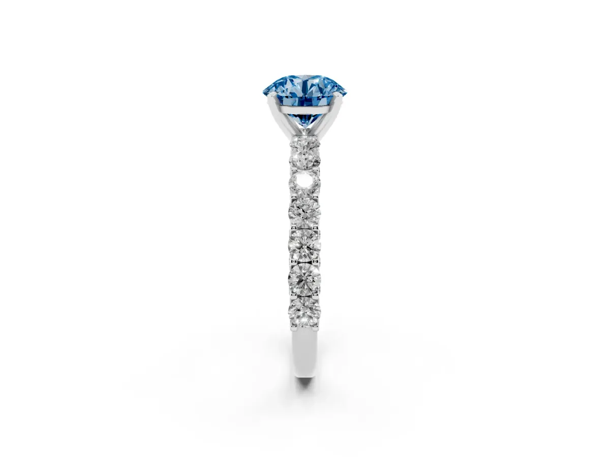 Fancy Blue Round Cut Diamond Solitaire Ring with Shared Prong Pavé Band and Four-Prong Setting Silver