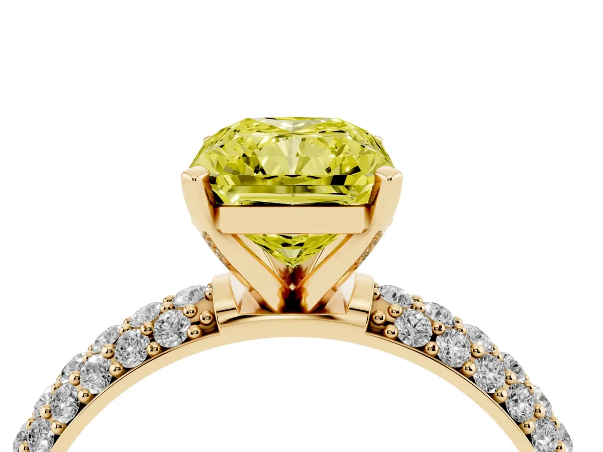 Fancy Yellow Radiant Cut Diamond Solitaire Ring with Prong Setting and Pavé Band Yellow gold