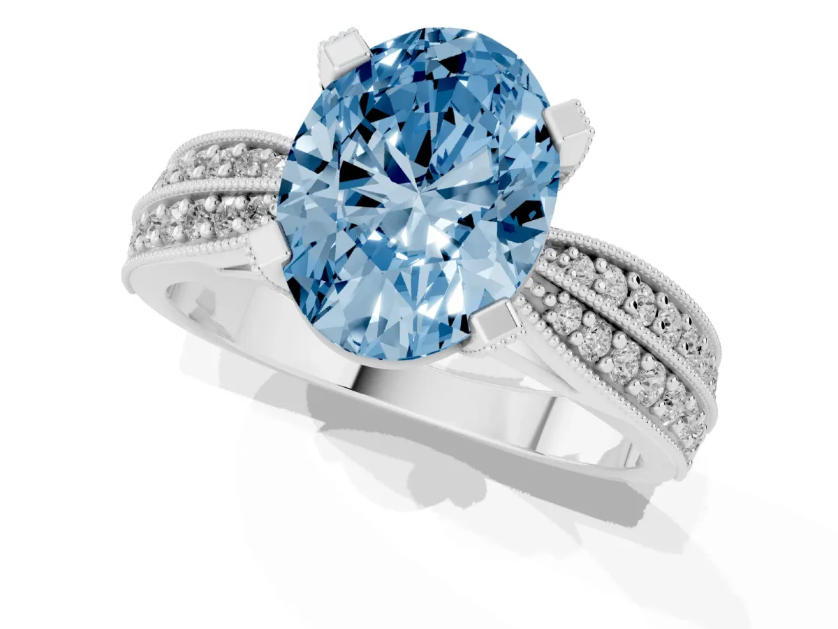 Fancy Blue Oval Cut Diamond Solitaire Ring with Milgrain Round Pavé Band and Prong Setting Silver