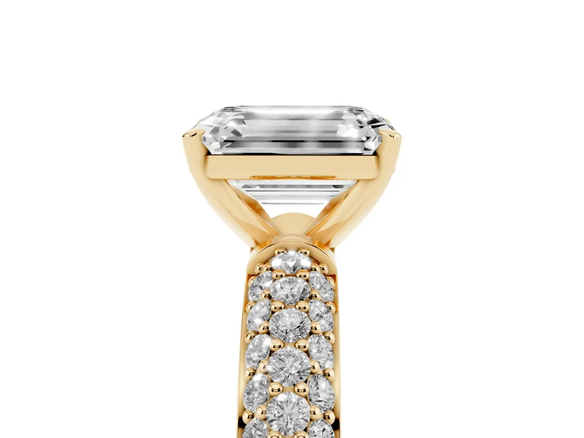 Emerald Cut Diamond Solitaire Ring with Prong Setting and Pavé Band Yellow gold