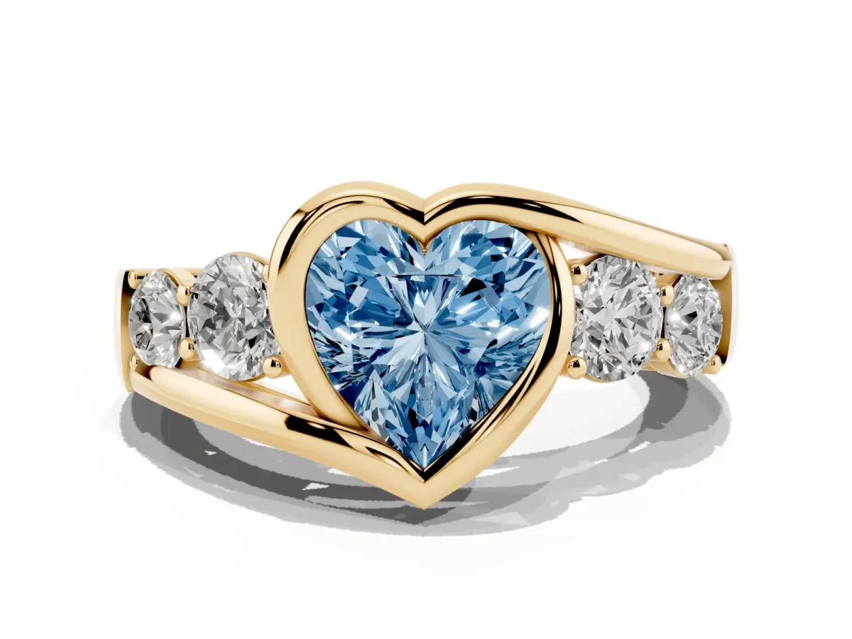 Fancy Blue Bezel Set Heart Cut Diamond Bypass Ring with Round Accents Yellow gold