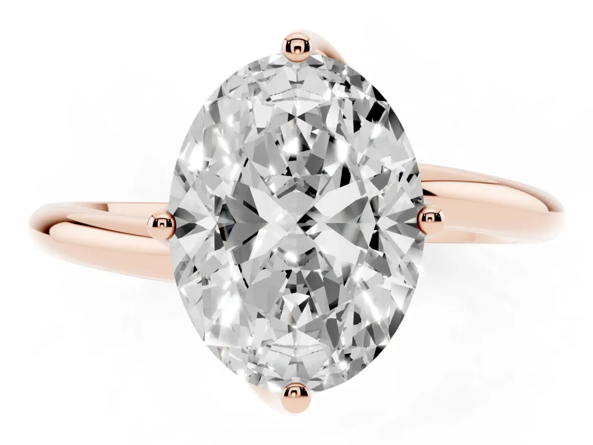 Oval Cut Diamond Solitaire Engagement Ring with Four-Prong Setting and Classic Band Rose gold