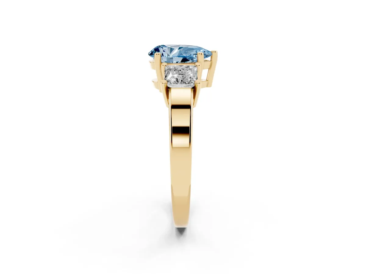 Fancy Blue Three-Stone Pear Cut Cut Solitaire Ring with Prong Setting Yellow gold