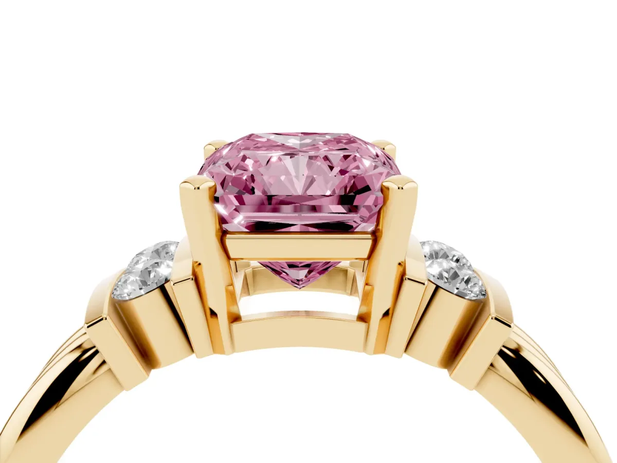 Fancy Pink Radiant Cut Cut Three-Stone Channel Set Ring with Bar Prongs Yellow gold