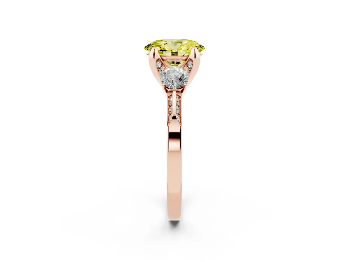 Fancy Yellow Oval Cut Brilliant Three-Stone Diamond Ring with Pavé Band and Four-Prong Setting Rose gold