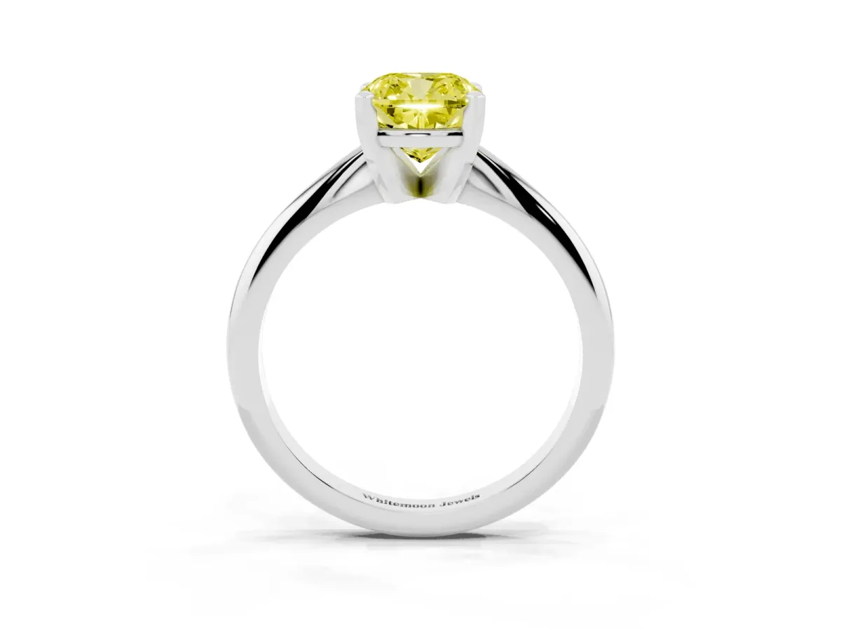 Fancy Yellow Cushion Cut Cut Solitaire Ring with Four-Prong Setting on a Classic Band Silver