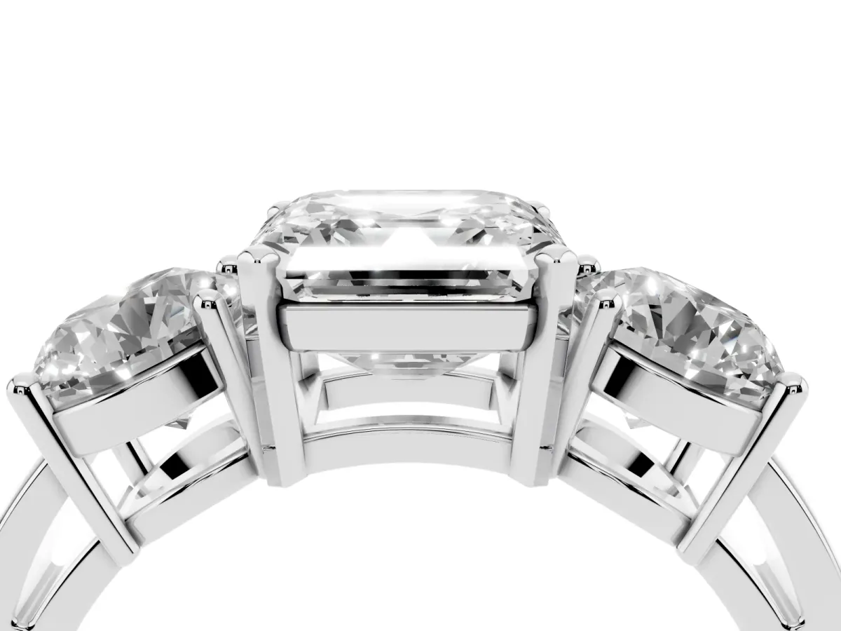 Three-Stone Asscher Cut Diamond Ring with Round Side Stones, Classic Band, and Four-Prong Setting Silver