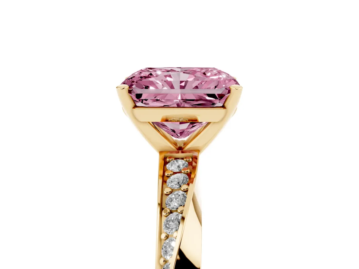 Fancy Pink Radiant Cut Diamond Engagement Ring with Side Stone Accents and Four-Prong Setting Yellow gold