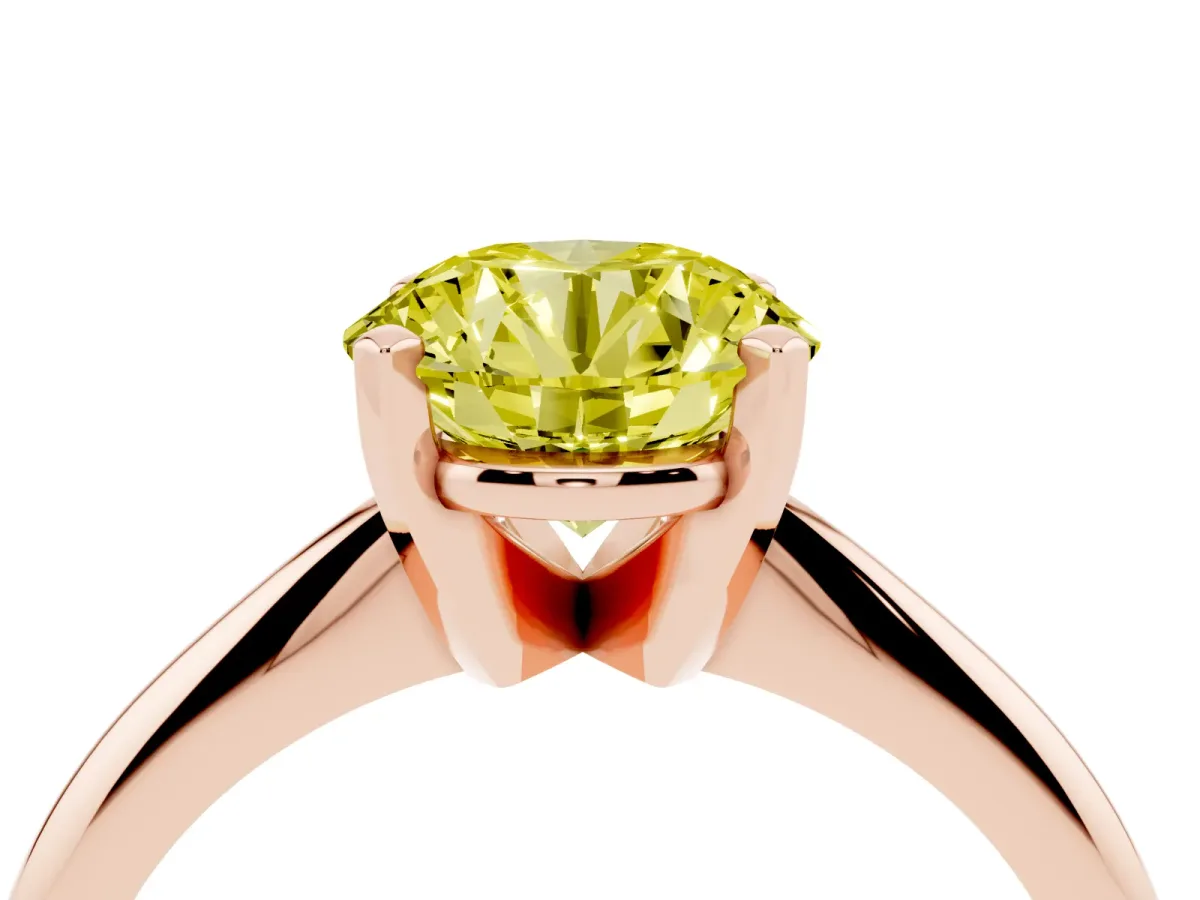 Fancy Yellow Round Cut Cut Solitaire Ring with Four-Prong Setting on a Classic Band Rose gold