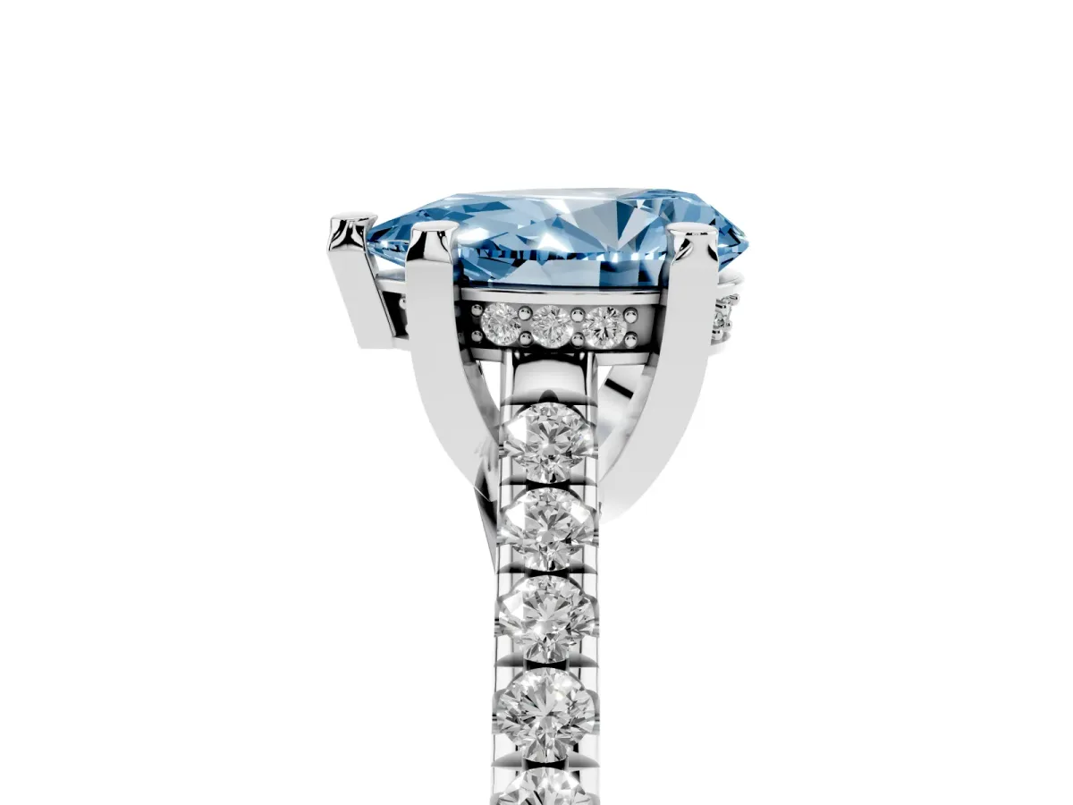 Fancy Blue Pear Cut Brilliant Diamond Solitaire with Pavé Band and Four-Prong Setting Silver