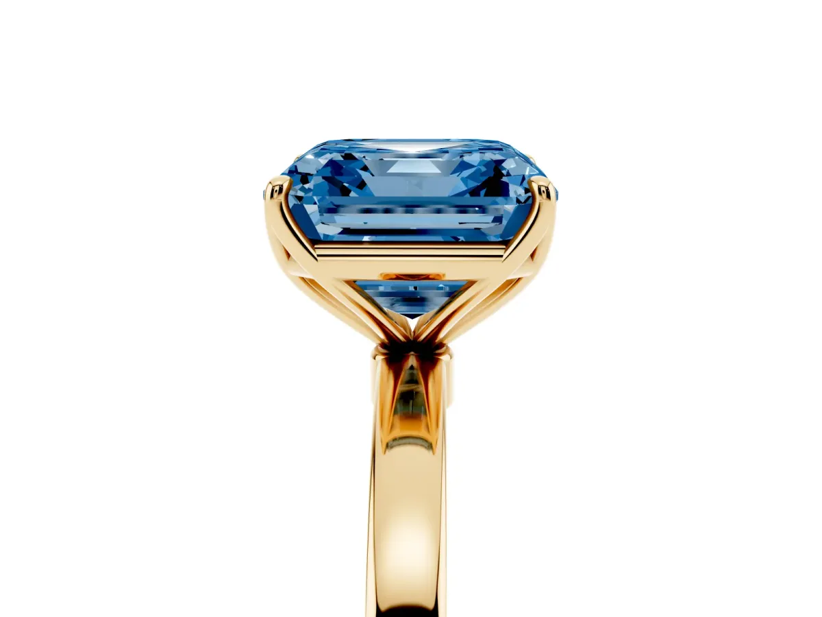 Fancy Blue Asscher Cut Diamond Solitaire Ring with Thin Band and Prong Setting Yellow gold