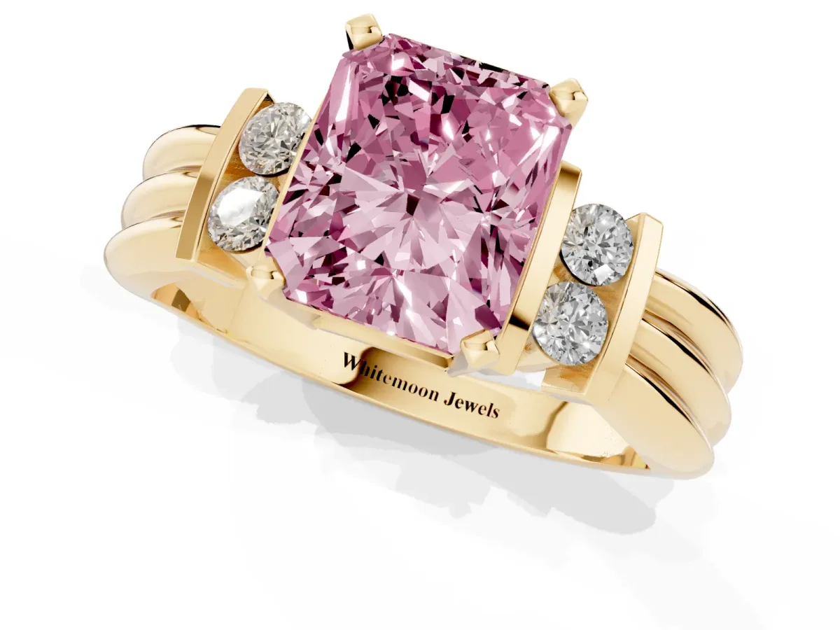 Fancy Pink Radiant Cut Cut Three-Stone Channel Set Ring with Bar Prongs Yellow gold