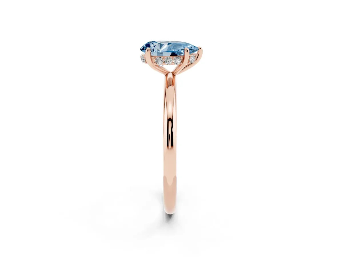 Fancy Blue Pear Cut Solitaire Diamond Ring with a Classic Band and Four-Prong Setting Rose gold