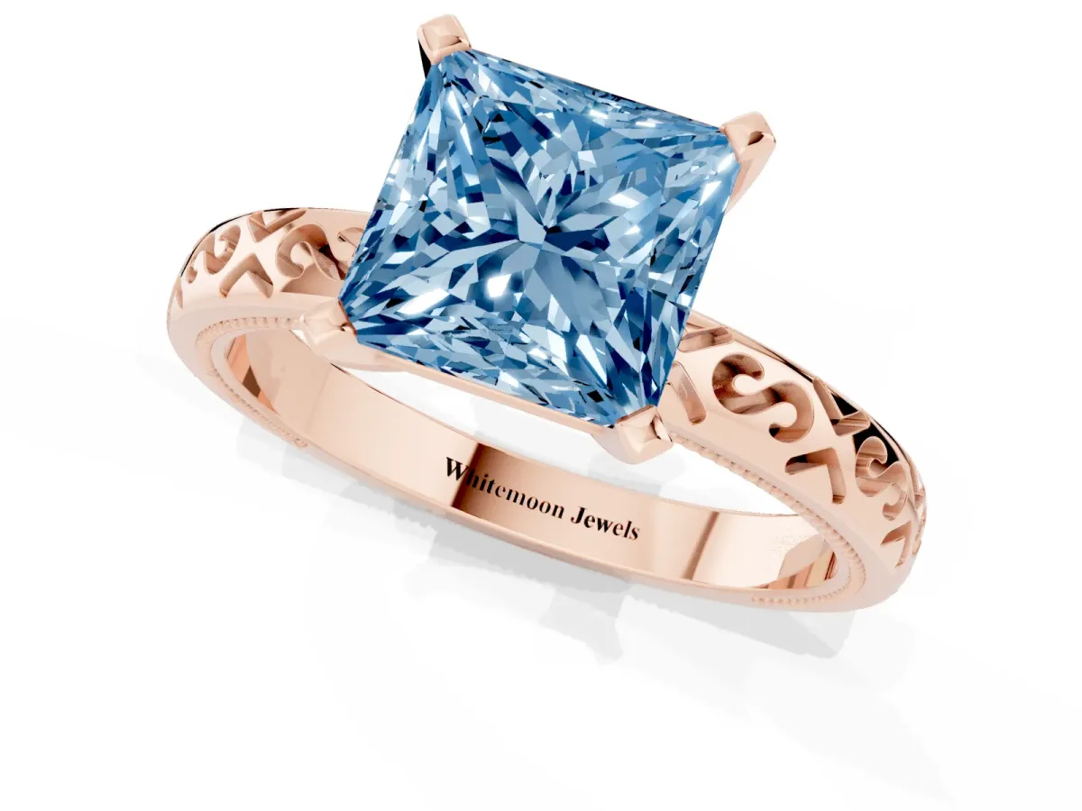 Fancy Blue Princess Cut Solitaire Engagement Ring with Scrollwork Band and Four-Prong Setting Rose gold