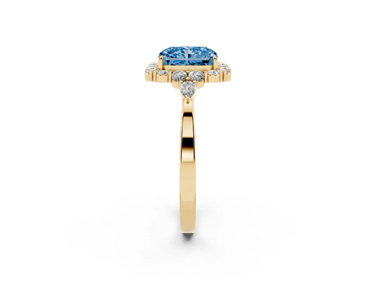 Fancy Blue Radiant Cut Diamond Halo Ring with Pear Side Stones and Prong Setting Yellow gold