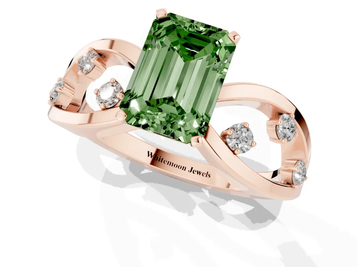 Fancy Green Emerald Cut Cut Solitaire Diamond with Side Stones on Criss-Cross Band and Four-Prong Setting Rose gold