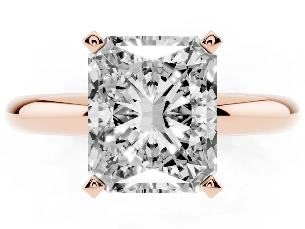 Radiant Cut Diamond Solitaire Engagement Ring with Round Band and Four-Prong Setting Rose gold