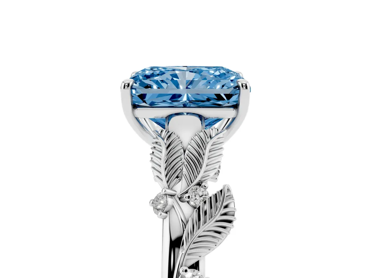 Fancy Blue Radiant Cut Diamond Solitaire Ring with Leaf Motif Band and Four-Prong Setting Silver