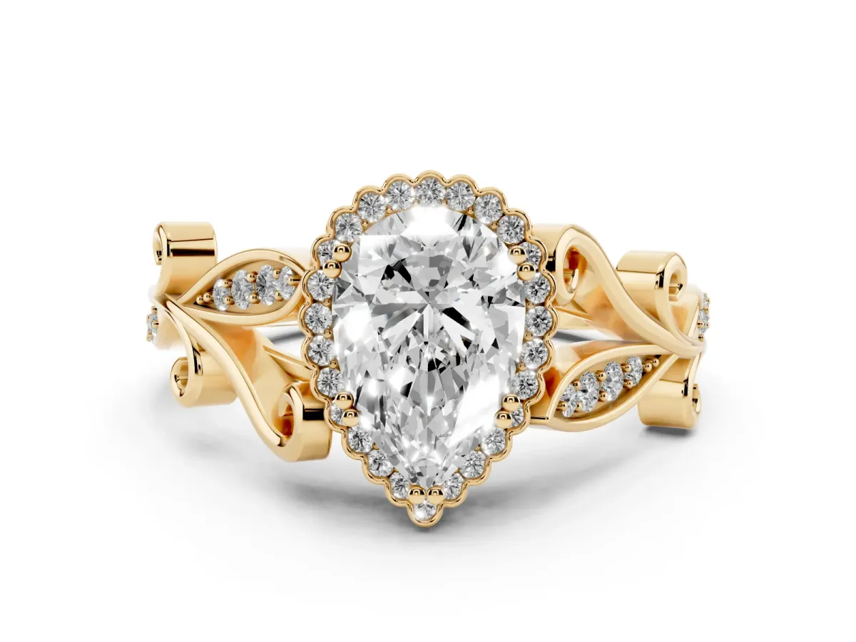 Pear Cut Diamond Halo Ring with Vintage Split Shank and Four-Prong Setting Yellow gold