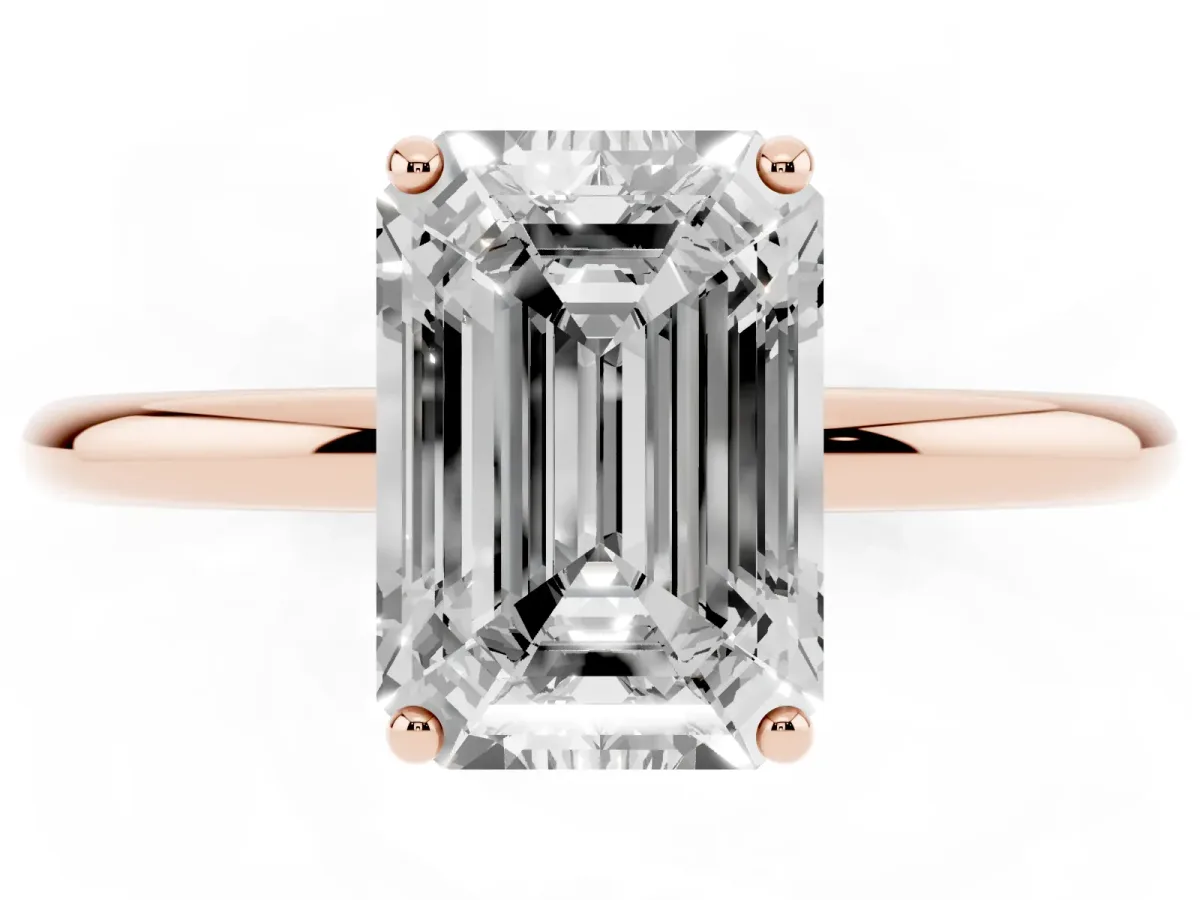 Emerald Cut Solitaire Diamond Ring with a Classic Band and Four-Prong Setting Rose gold