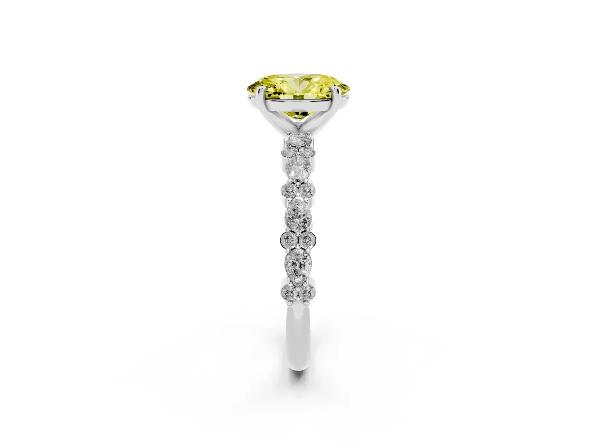 Fancy Yellow Oval Cut Diamond Side Stone Solitaire Ring with Round and Four-Prong Setting Platinum