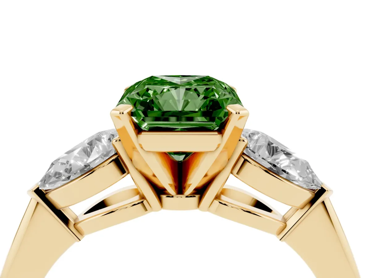 Fancy Green Three-Stone Radiant Cut Diamond Ring with Pear Side Stones and Four-Prong Setting Yellow gold