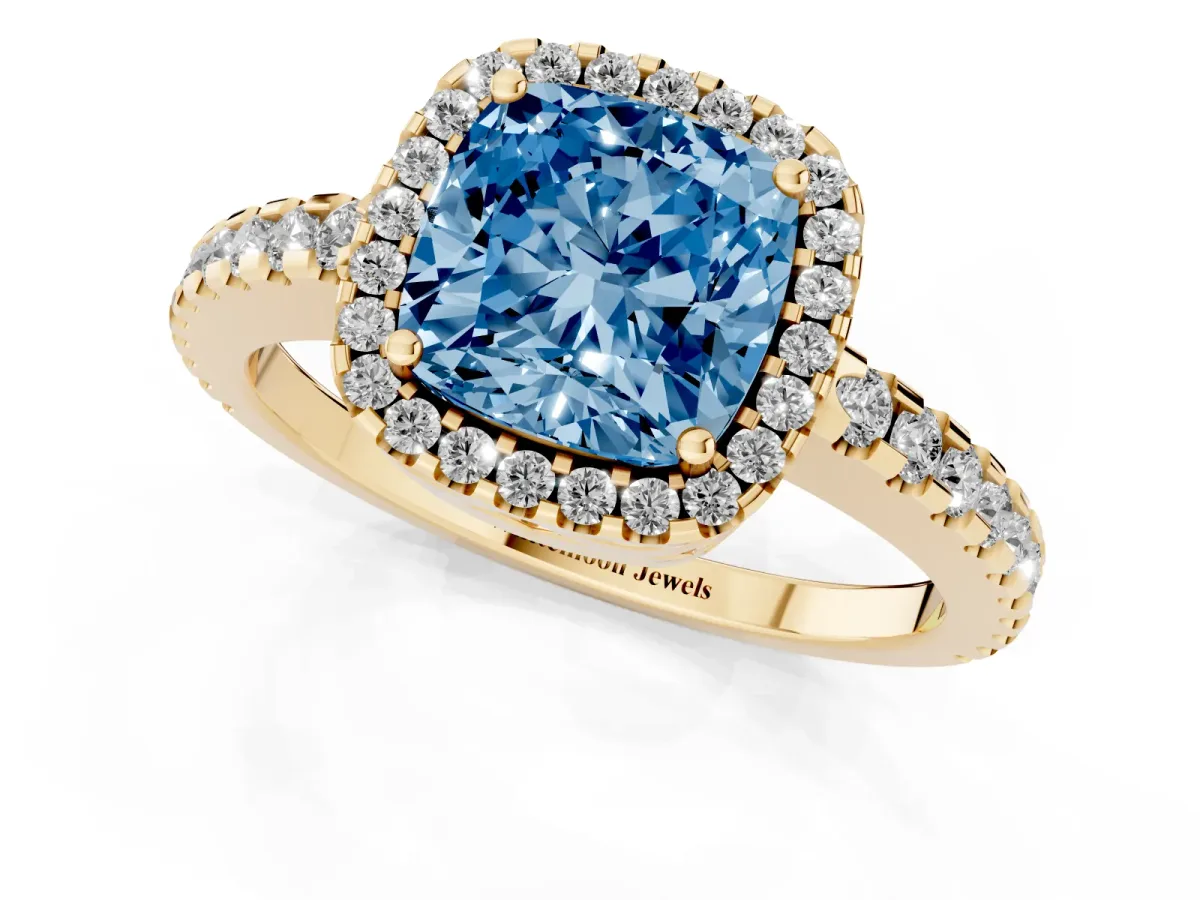 Fancy Blue Cushion Cut Diamond Halo Engagement Ring with Pavé Band and Prong Setting Yellow gold