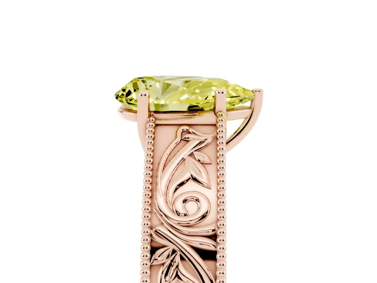 Fancy Yellow Pear Cut Diamond Solitaire Ring with Engraved Band and Four-Prong Setting Rose gold