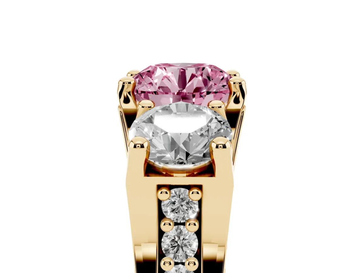 Fancy Pink Round Cut Diamond Three-Stone Ring with Channel Set Band and Four-Prong Setting Yellow gold