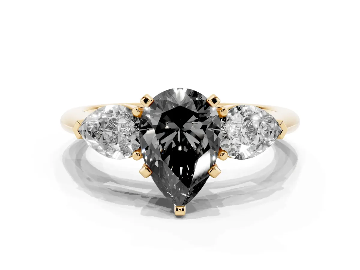 Fancy Black Three-Stone Pear Cut Diamond Ring with Pear Side Stones and Four-Prong Setting Yellow gold