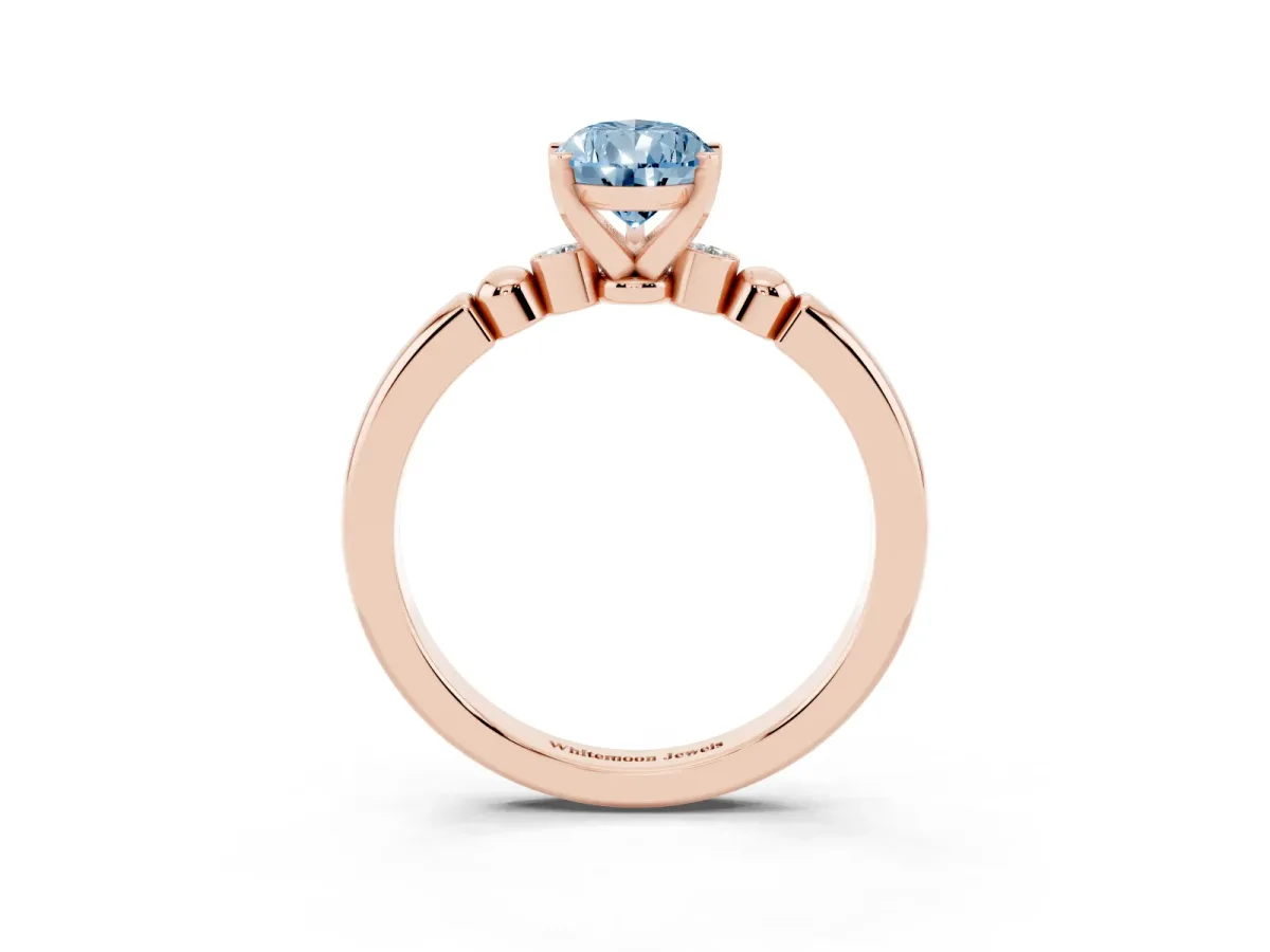 Fancy Blue Pear Cut Solitaire Beaded Band with Four-Prong Setting Rose gold