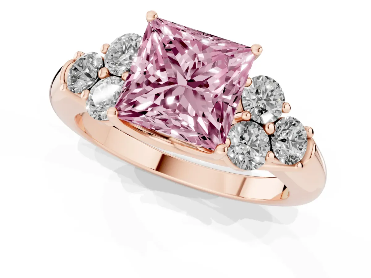 Fancy Pink Princess Cut Cut Diamond Cluster Ring with Round Accent Stones and Prong Setting on a Classic Band Rose gold