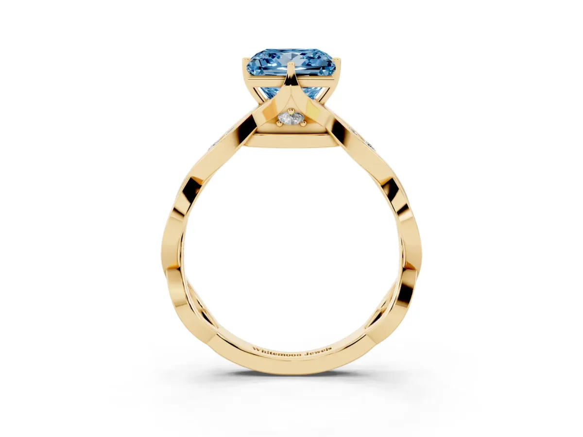 Fancy Blue Princess Cut Solitaire Twist Band with Leaf Prong Setting Yellow gold