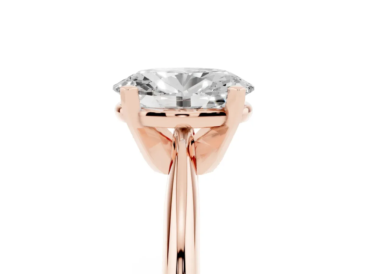 Oval Cut Cut Solitaire Ring with Four-Prong Setting on a Classic Band Rose gold