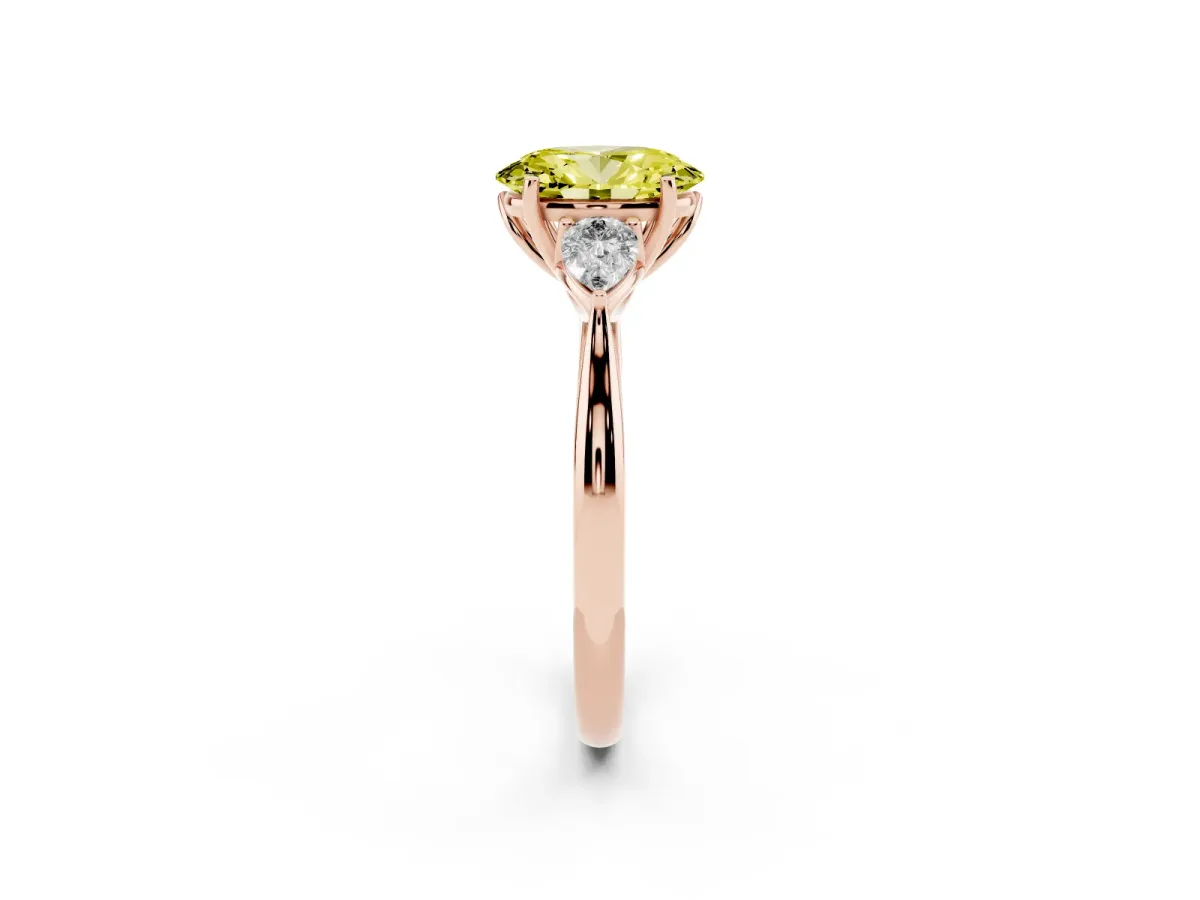 Fancy Yellow Three-Stone Oval Cut Diamond Ring with Pear Side Stones in Four-Prong Setting Rose gold