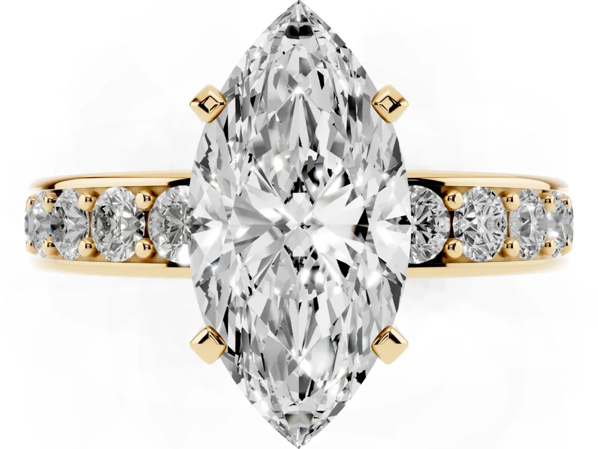 Marquise Cut Diamond Engagement Ring with Channel Set Round Band and Prong Setting Yellow gold