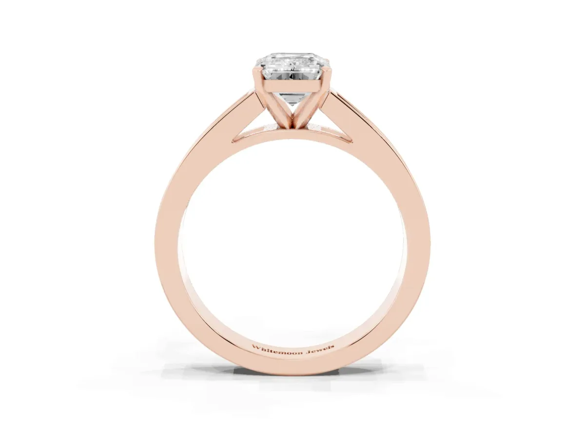 Emerald Cut Solitaire Diamond Ring with Channel-Set Band and Four-Prong Setting Rose gold