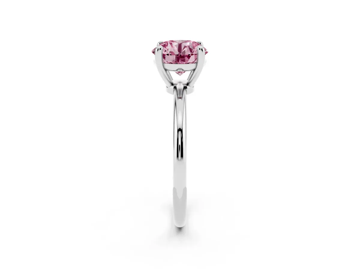 Fancy Pink Round Cut Solitaire Diamond Ring with 4-Prong Setting on a Classic Band Platinum