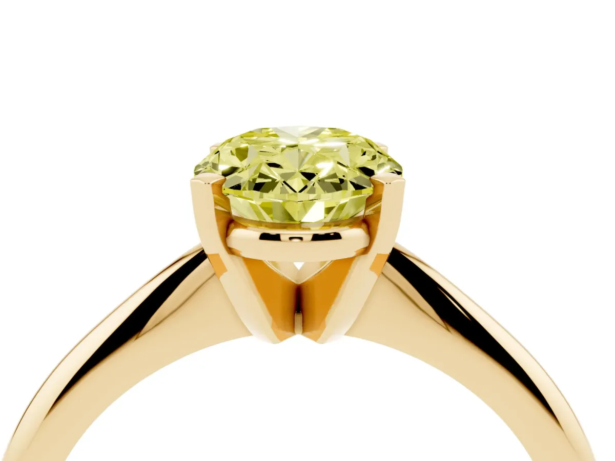 Fancy Yellow Oval Cut Cut Solitaire Ring with Four-Prong Setting on a Classic Band Yellow gold