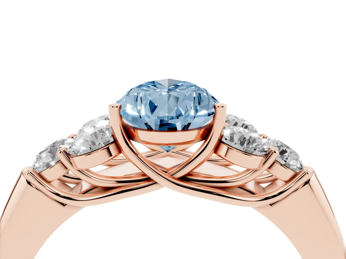 Fancy Blue Pear Cut Cut Diamond Cluster Ring with Round Accent Stones and Prong Setting on a Classic Band Rose gold