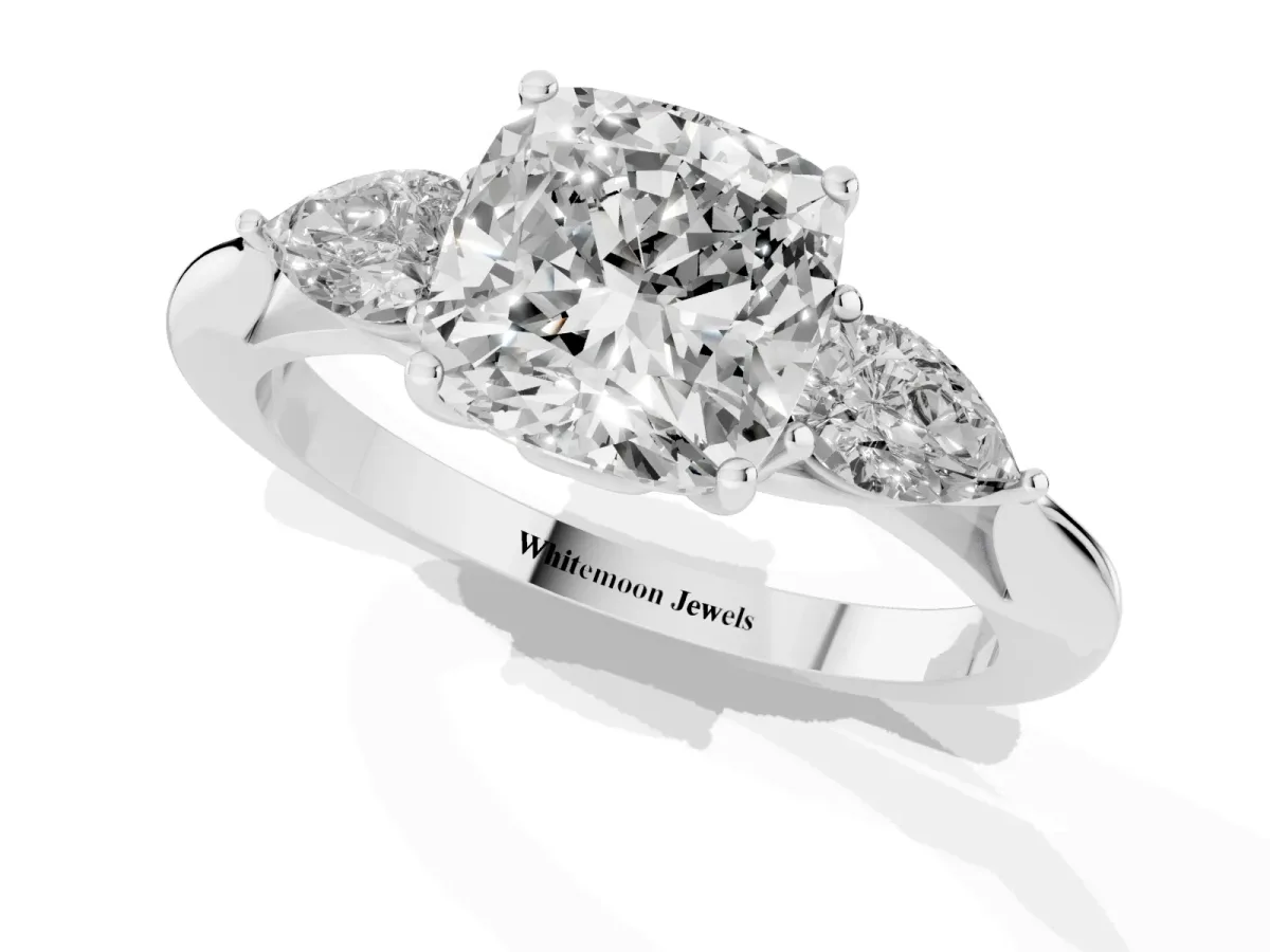 Cushion Cut Diamond Three-Stone Ring with Pear Side Stones and Prong Setting Platinum