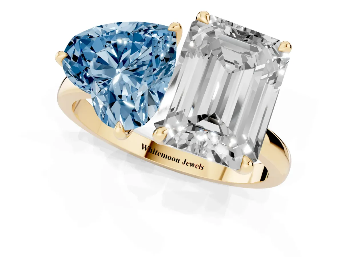 Fancy Blue Heart Cut and Emerald Cut Toi Moi Ring with Prong Setting Yellow gold