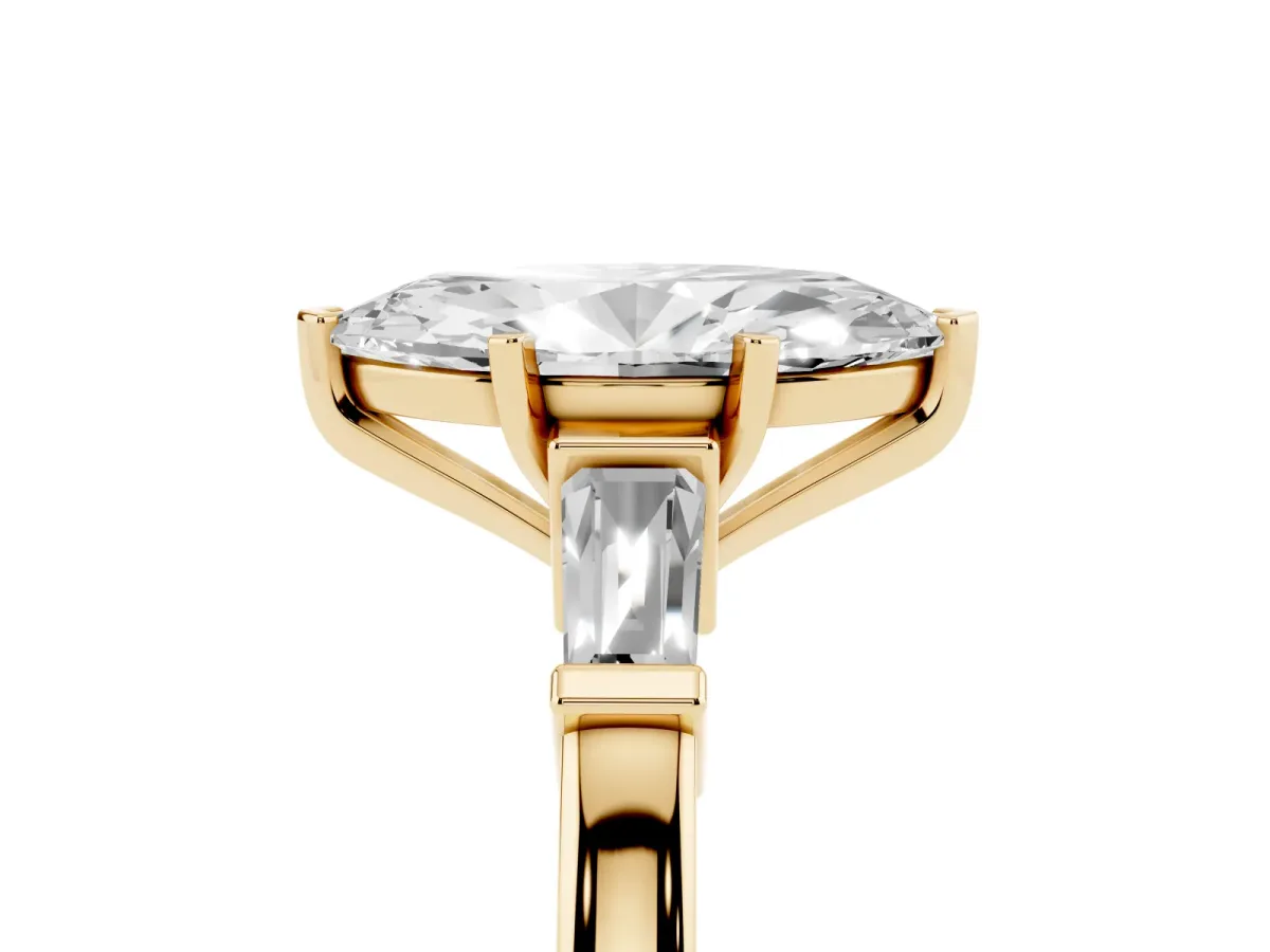Marquise Cut Cut Diamond Solitaire Ring with Tapered Baguette Accents and Four-Prong Setting Yellow gold