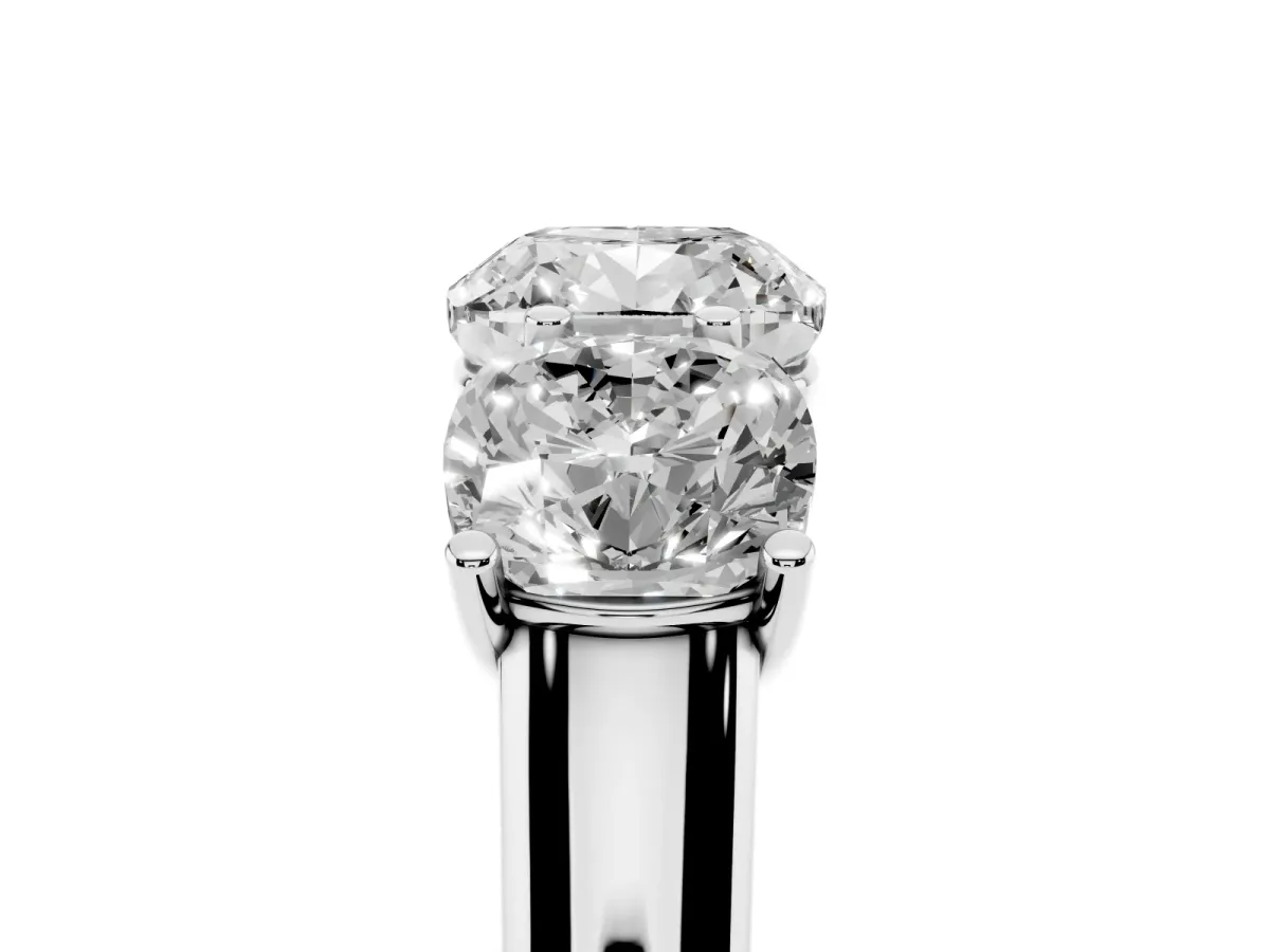 Cushion Cut Three-Stone Diamond Ring with Prong Setting on a Classic Band Silver