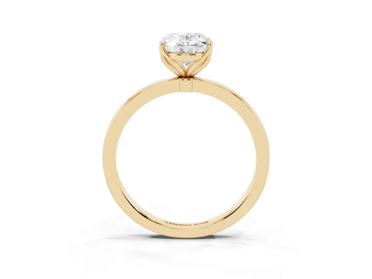 Oval Cut Diamond Solitaire Ring with Thin Band and Prong Setting Yellow gold