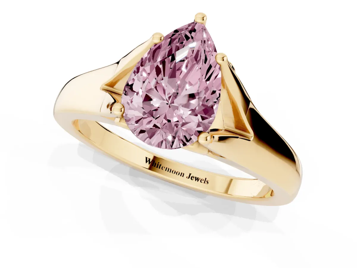Fancy Pink Pear Cut Solitaire Diamond Ring with Cathedral Band and Four-Prong Setting Yellow gold