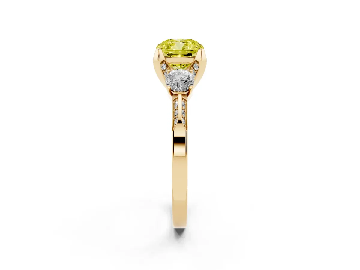 Fancy Yellow Cushion Cut Brilliant Three-Stone Diamond Ring with Pavé Band and Four-Prong Setting Yellow gold