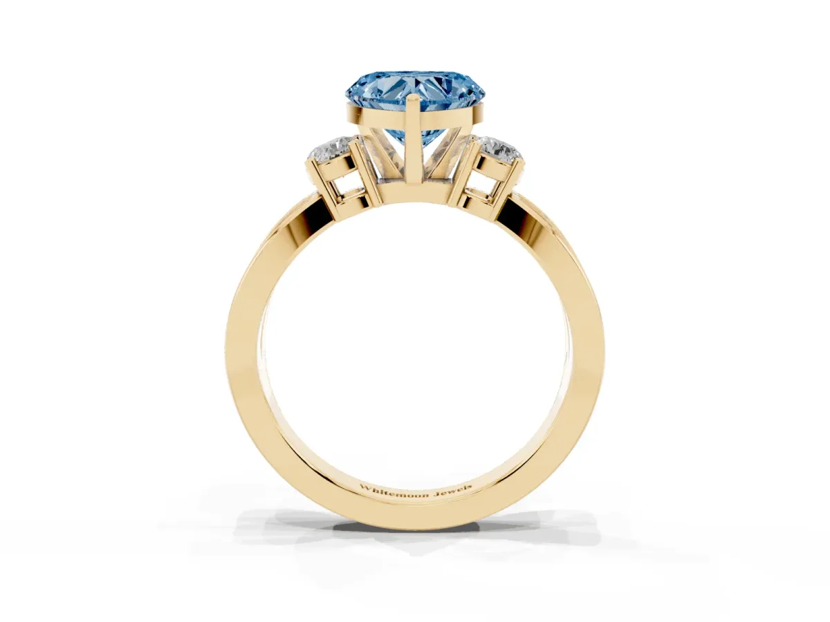 Fancy Blue Three-Stone Heart Cut Cut Diamond Twist Band with Prong Setting Yellow gold