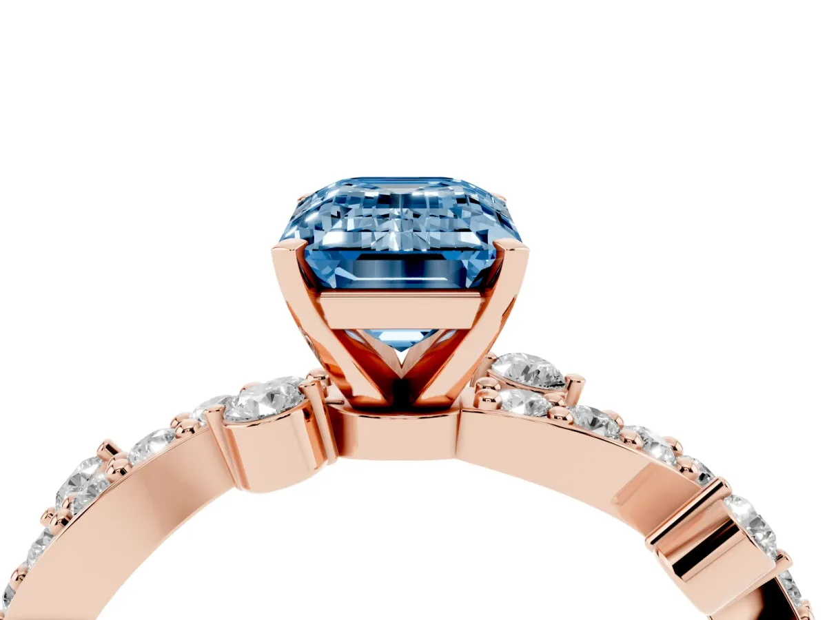 Fancy Blue Emerald Cut Cut Solitaire Diamond Twisted Band with Pave Setting Rose gold