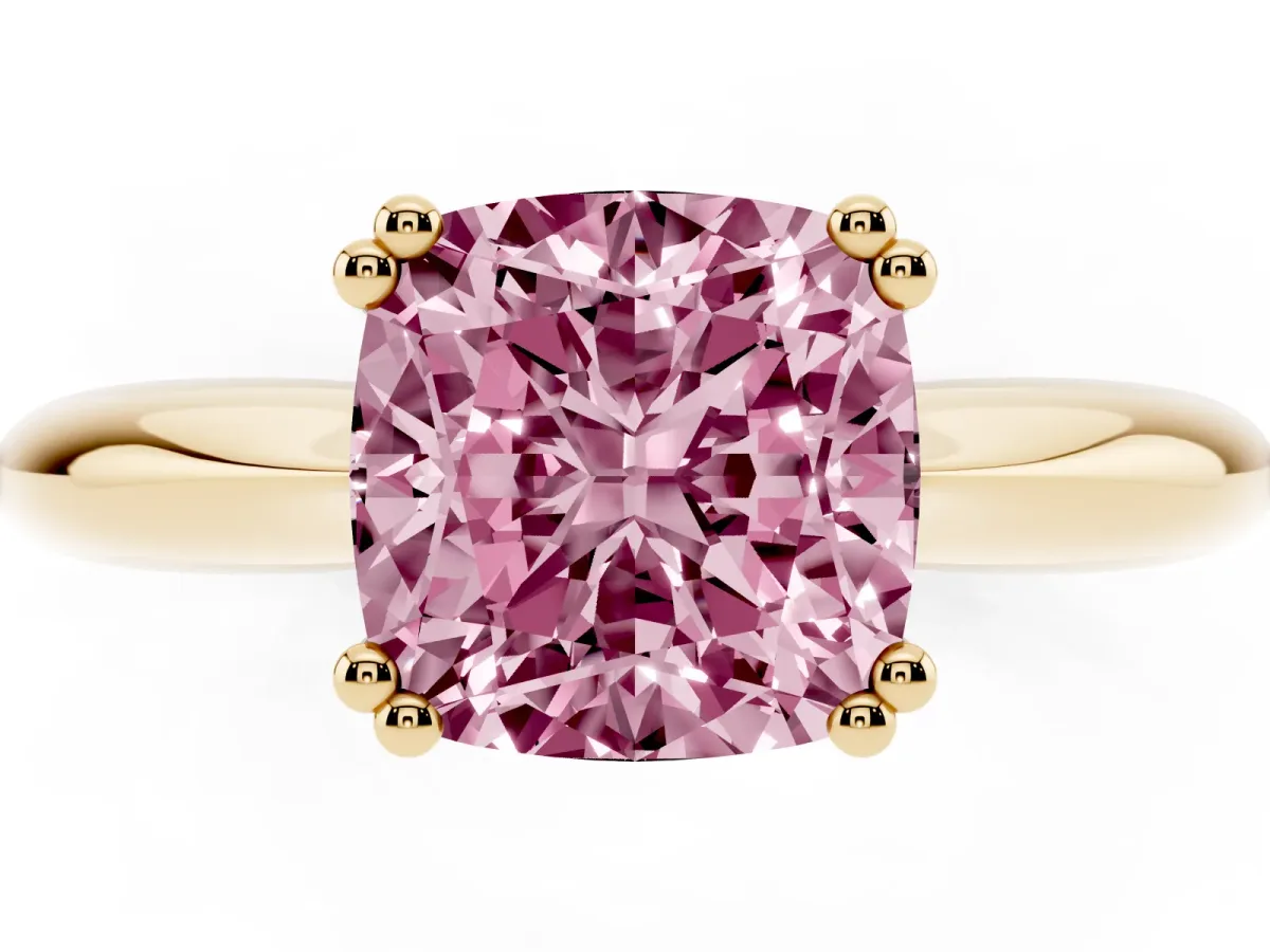 Fancy Pink Cushion Cut Cut Solitaire Engagement Ring with Tapered Band and Four-Prong Setting Yellow gold